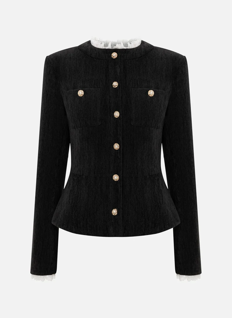 ليتشي جاكيت من جلد الغزال بتفاصيل متباينة